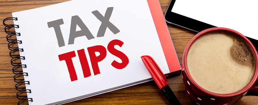 Tax Tips written on a notepad